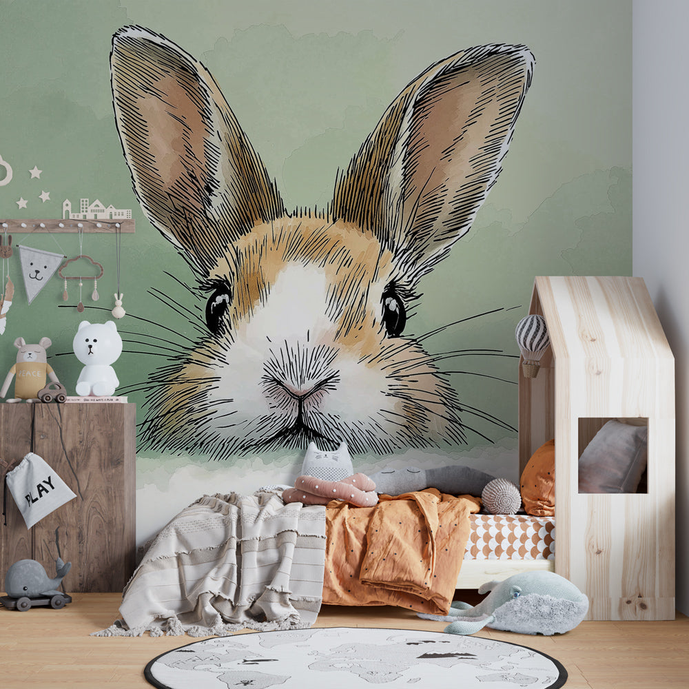 Gentle bunny mural wallpaper for baby room with natural nursery furniture and soft lighting