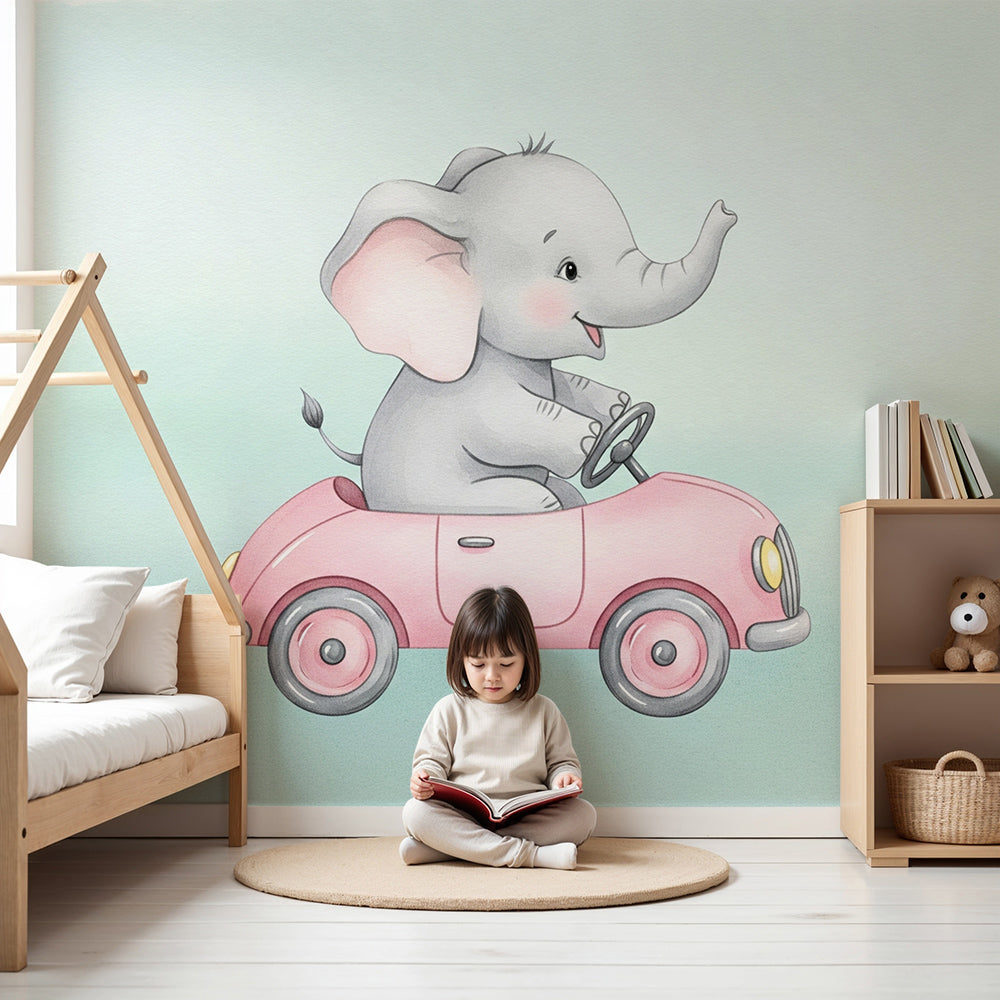 Kids-Mundo baby elephant pink car wall mural installed in a soft mint nursery with a cot and rug.