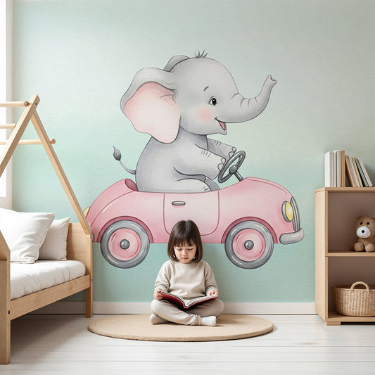 Kids-Mundo baby elephant pink car wall mural installed in a soft mint nursery with a cot and rug.