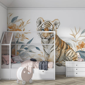 Safari themed kids bedroom featuring baby tiger wallpaper with tropical flowers and natural decor