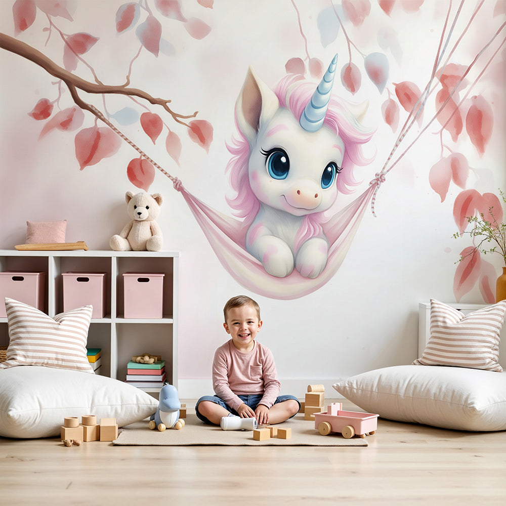 Pastel unicorn wall mural by Kids-Mundo styled behind a cot in a soft pink nursery