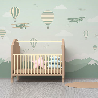 Kids-Mundo hot air balloon wall mural styled in a playroom with toys and a soft rug