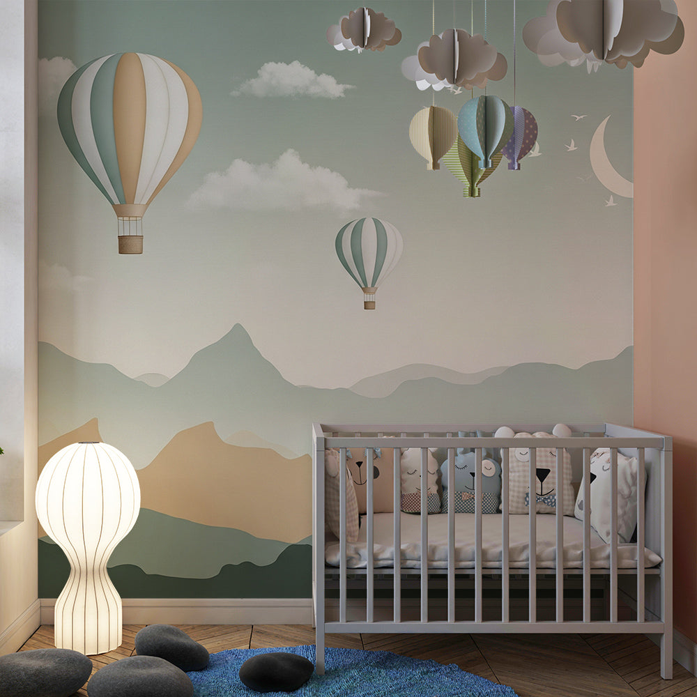 Kids-Mundo hot air balloon wall mural in a cosy playroom with a reading nook