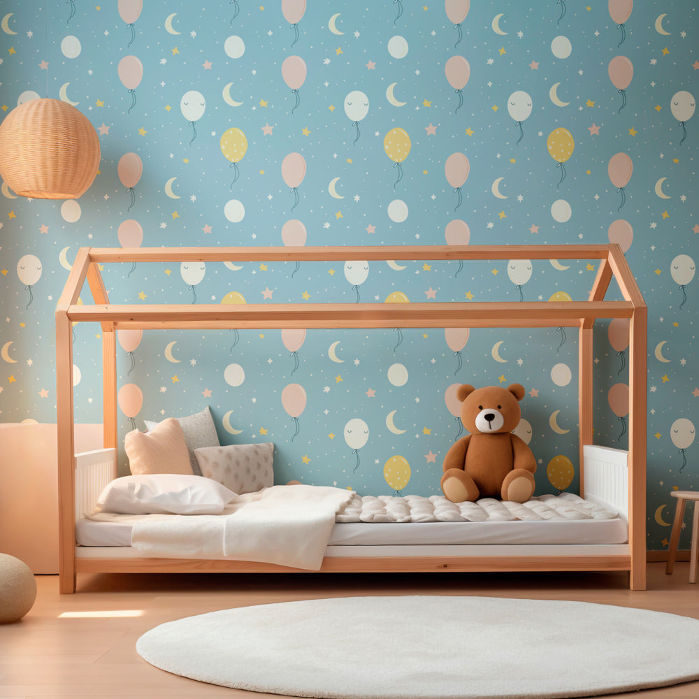 Smiling balloon wallpaper with celestial motifs decorating modern children's bedroom interior