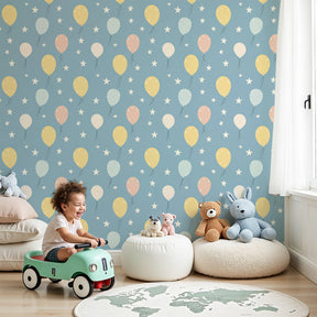 Colorful balloon mural wallpaper decorating modern nursery with pastel party theme by Kids-Mundo