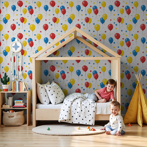 Colorful balloon mural wallpaper creating festive atmosphere in modern children's bedroom by Kids-Mundo