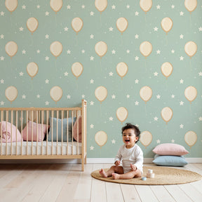 Balloon and stars mural wallpaper in bright nursery room with white furniture by Kids-Mundo