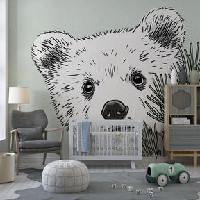 Curious bear cub wallpaper creating adventure-themed children's bedroom with natural elements