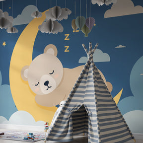 Teddy bear moon and stars mural wallpaper complementing modern nursery furniture and decor