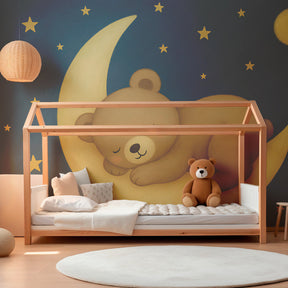 Sleeping bear moon wallpaper in modern toddler room with calming blue night sky theme