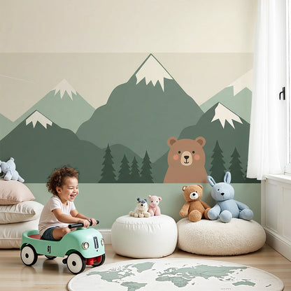 Kids-Mundo bear mountain wall mural in a calm sage-green nursery setting behind a white cot