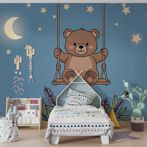 Gentle bear on swing wallpaper with moon and stars for soothing nursery decor