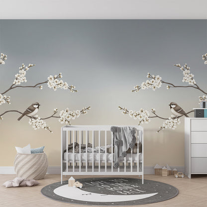 Kids-Mundo blossom branch bird wall mural behind a bed in a warm, neutral kids bedroom.