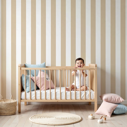 Kids-Mundo beige vertical stripe wall mural styled behind a cot in a calm neutral nursery.
