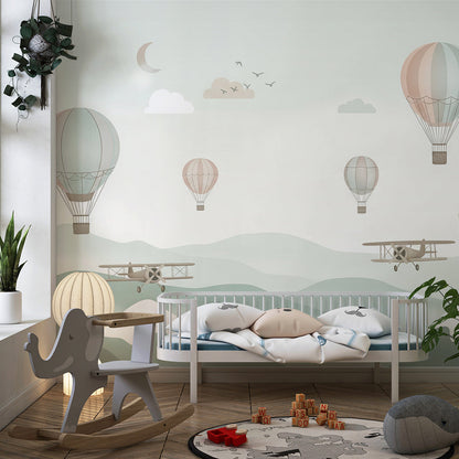 Kids-Mundo mountain balloon mural brightening a calm playroom accent wall for children