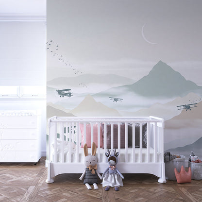 Kids-Mundo biplanes over mountains mural covering a feature wall in a kids' bedroom