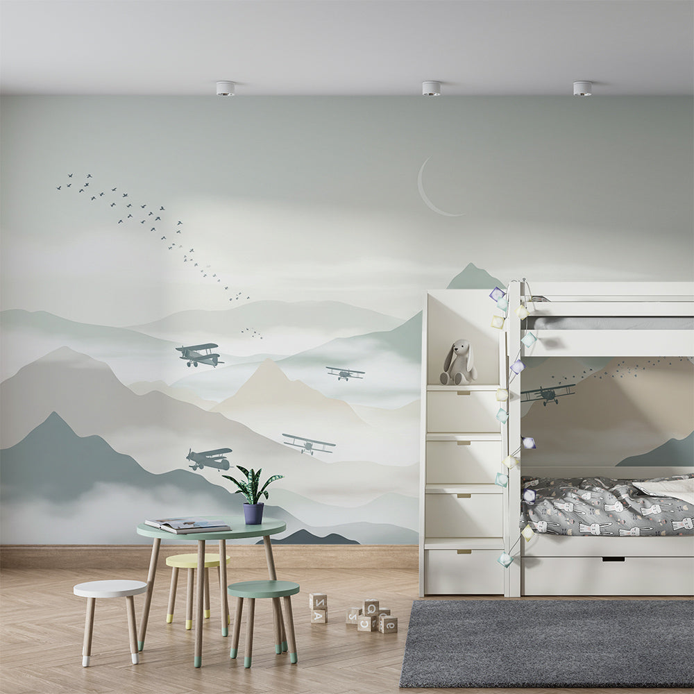 Kids-Mundo biplane sky wall mural with misty peaks brightening a children's playroom