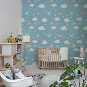 Blue sky mural wallpaper with cheerful birds creating imaginative kids playroom decor