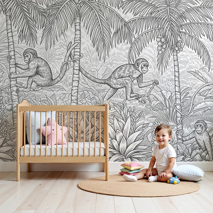 Kids-Mundo black and white jungle monkeys wall mural on a nursery wall behind a cot