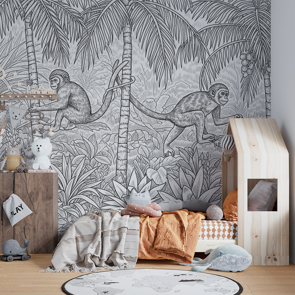 Kids-Mundo black and white jungle mural with climbing monkeys styled on a playroom wall
