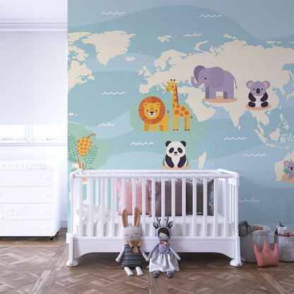 Kids-Mundo blue ocean world map wall mural with giraffe and koala motifs in a playroom
