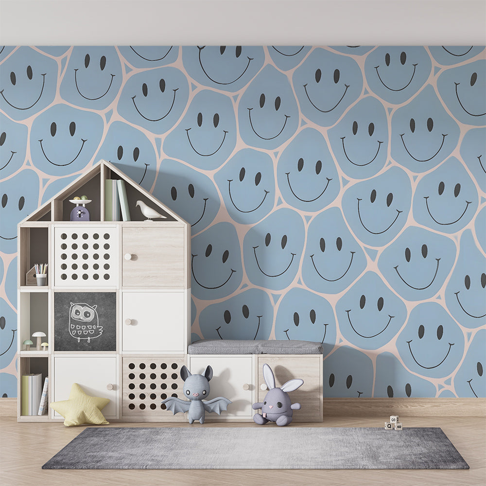Kids-Mundo blue smiley face wall mural behind a single bed in a cheerful kids' bedroom