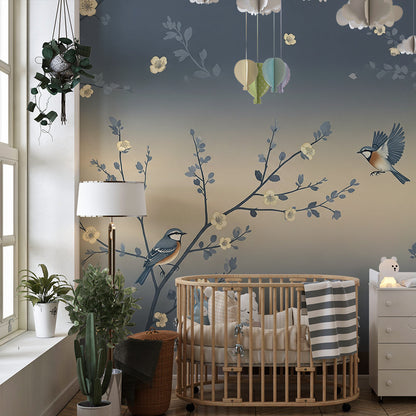 Kids-Mundo bird and blossom wall mural behind a toddler bed in a calm blue-grey kids bedroom.