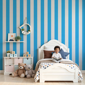 Blue and white striped mural wallpaper in modern nursery with wooden crib by Kids-Mundo