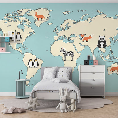Kids-Mundo sky-blue world map wall mural bringing penguins and a fox into a bright children's playroom
