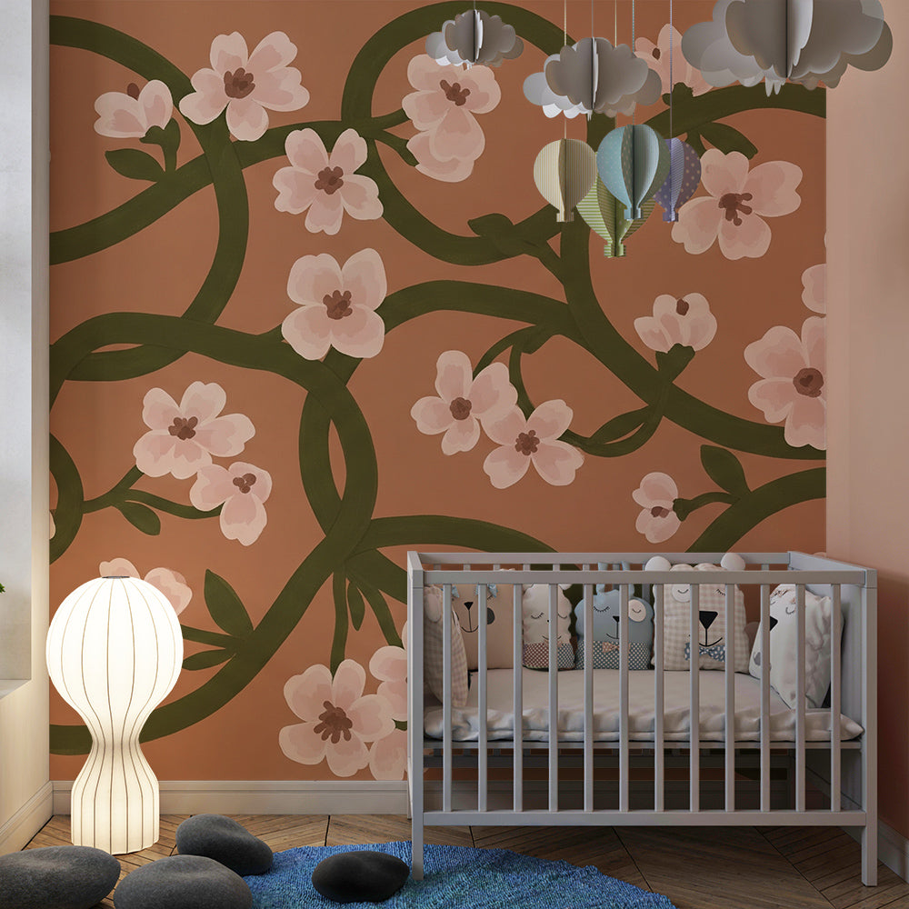 Kids-Mundo blush floral vine wallpaper covering a young girl's bedroom wall