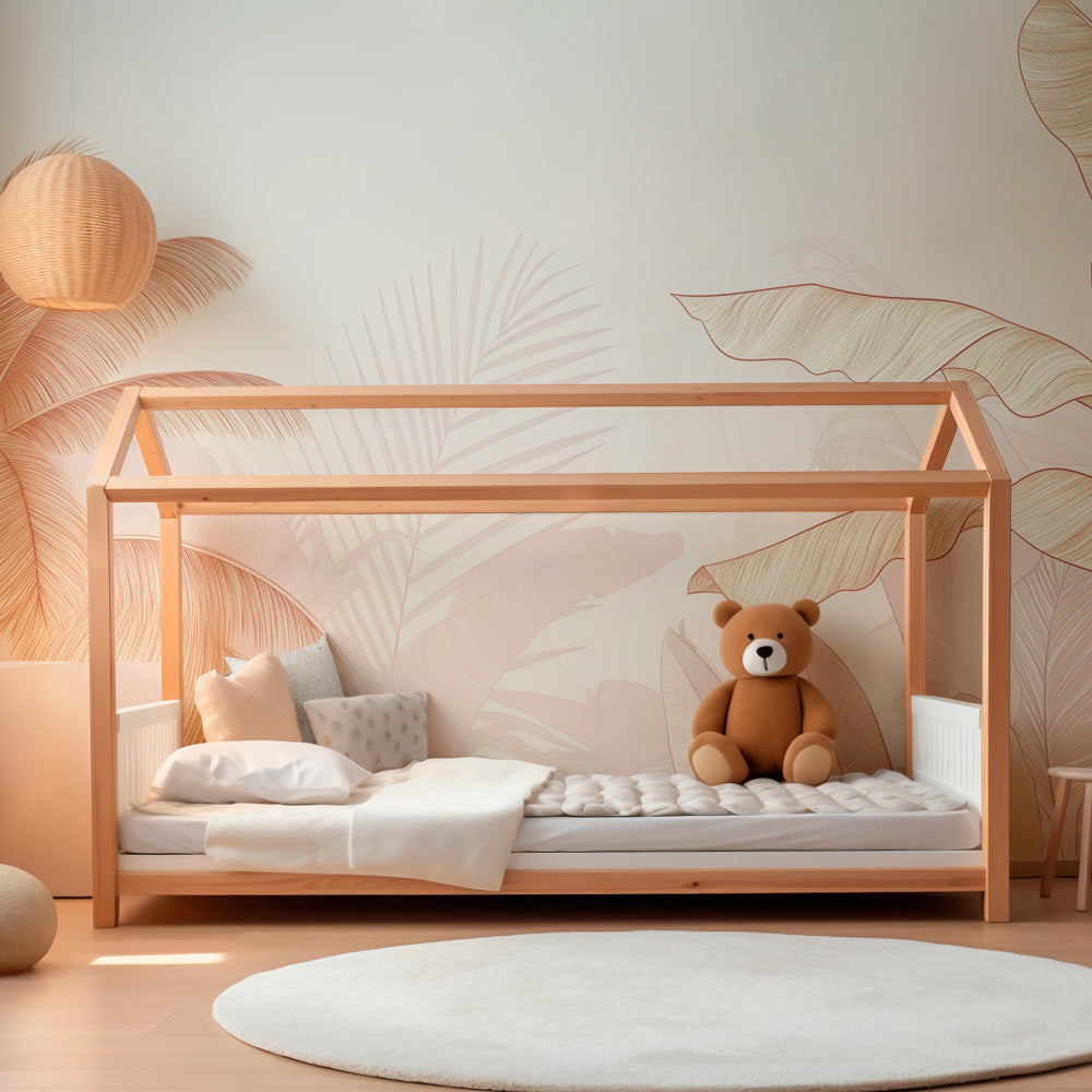 Kids-Mundo palm tree wall mural in a kids bedroom with blush pink and peach tones.