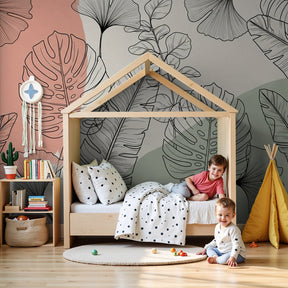 Botanical foliage mural wallpaper in modern nursery with natural wood furniture by Kids-Mundo