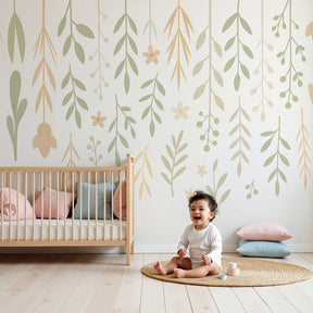 Botanical foliage mural wallpaper in modern nursery with natural wood furniture by Kids-Mundo