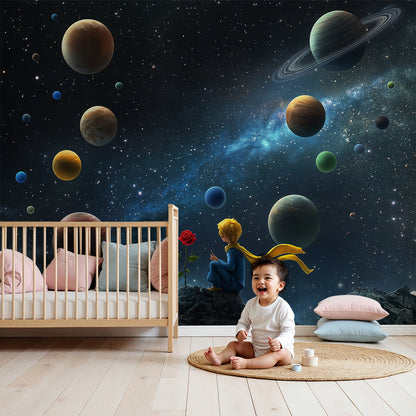 Kids-Mundo stargazing boy and planets wall mural styled above a cot in a soft, dreamy nursery