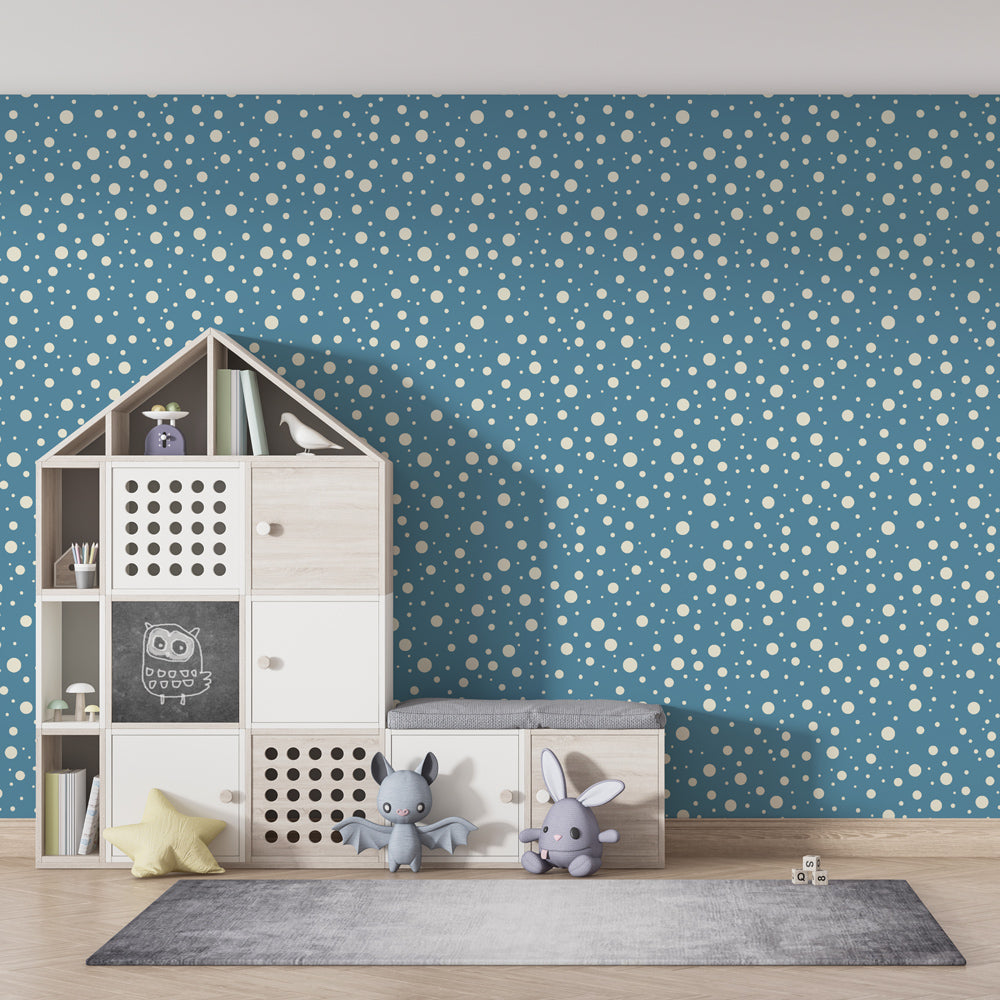 Calming bubble wallpaper creating serene atmosphere in children's bedroom with light furniture
