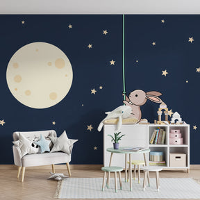 Moon and stars bunny mural wallpaper creating magical atmosphere in children's bedroom
