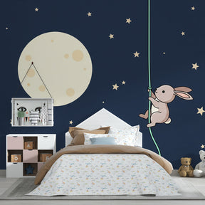 Celestial bunny wallpaper for kids room featuring climbing rabbit and lunar landscape by Kids-Mundo
