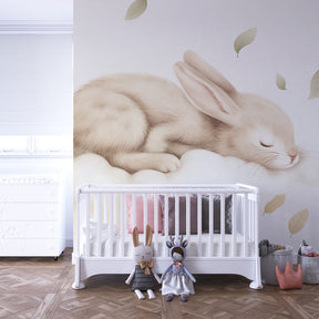 Dreamy bunny on cloud wallpaper creating serene atmosphere in baby's bedroom decor