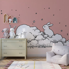 Starry bunny wallpaper in modern baby bedroom with white crib and soft decor