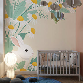 Nature-themed bunny wallpaper with blooming daisies creating calming playroom atmosphere