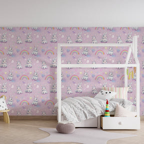 Pink rabbit wallpaper creating magical atmosphere in toddler bedroom decor