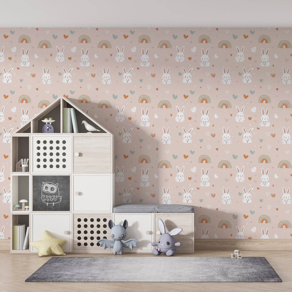 Cute bunny and rainbow wallpaper creating magical kids bedroom decor with natural wood furniture
