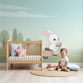 Bunny scooter mural wallpaper in bright nursery with wooden crib by Kids-Mundo