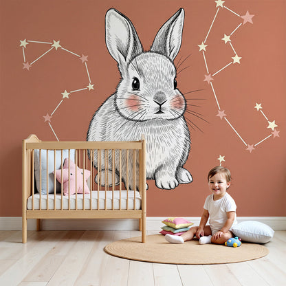 Kids-Mundo bunny and star constellation wall mural in a soft terracotta nursery setting