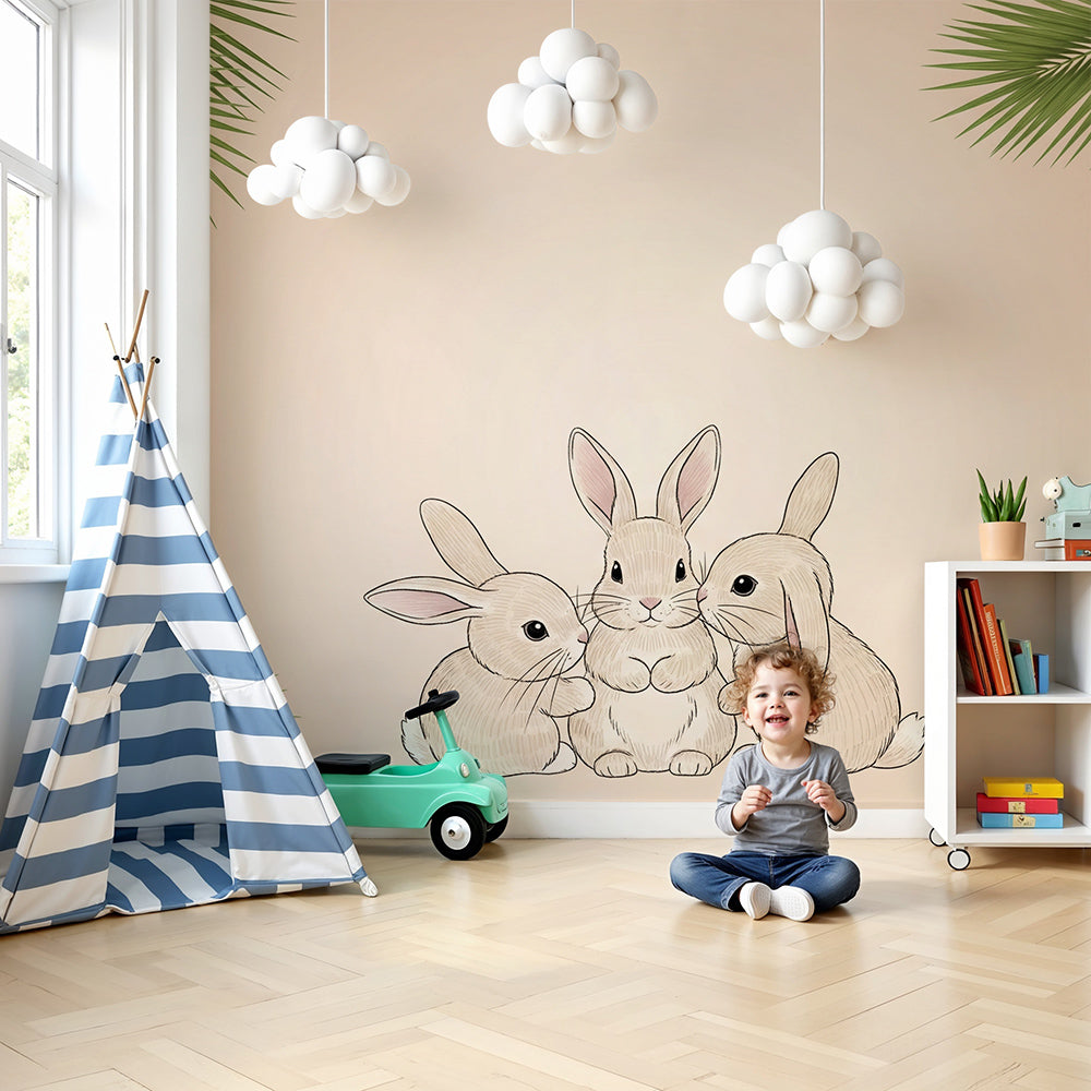 Kids-Mundo bunny wall mural in a soft beige nursery with palm leaf corners behind a white cot