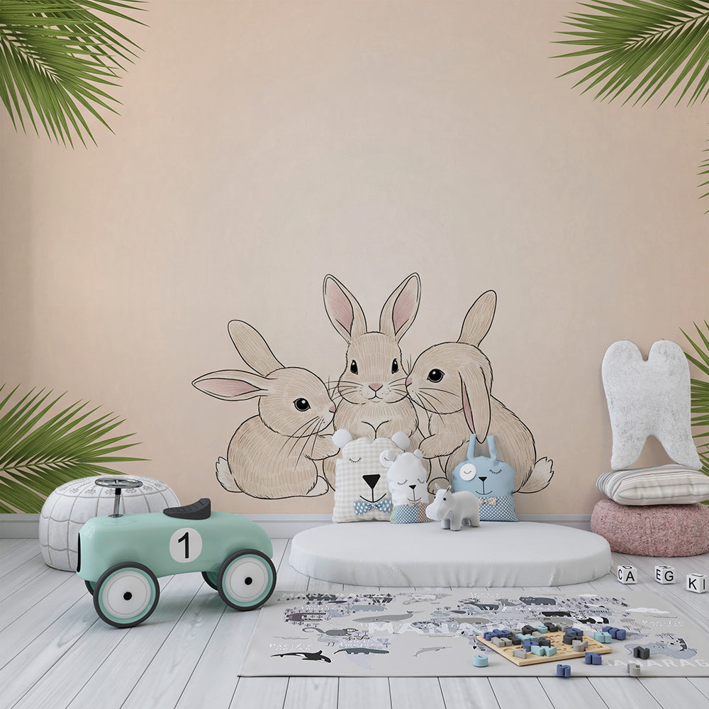 Kids-Mundo bunny and palm leaf wall mural brightening a beige playroom feature wall