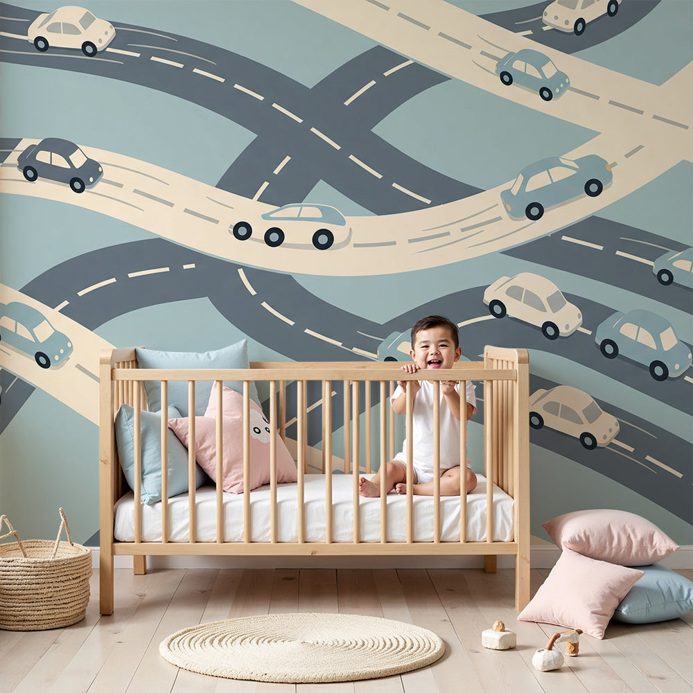 Kids-Mundo cars wall mural in a bright blue and cream nursery with cot and rug