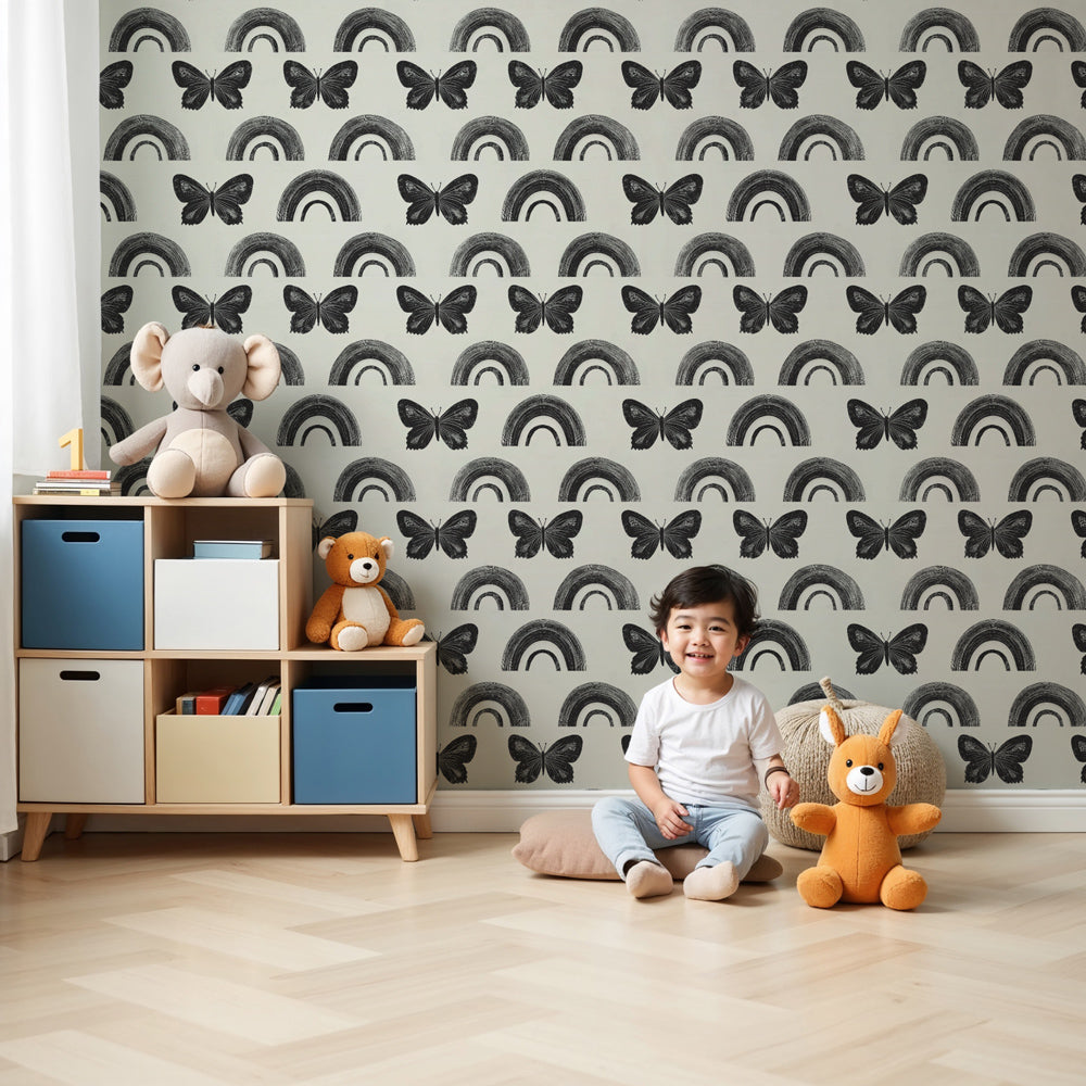 Butterfly rainbow mural wallpaper decorating modern kids nursery with wooden furniture by Kids-Mundo