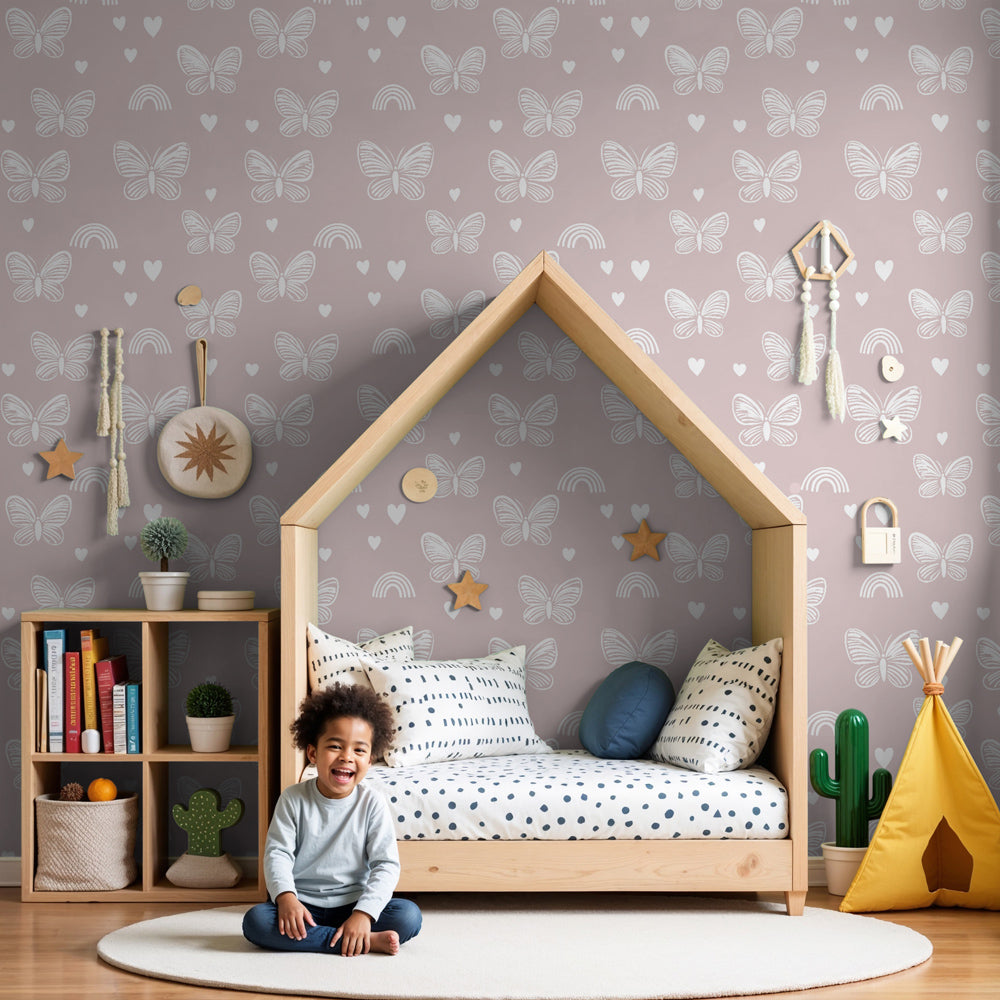 Pink butterfly mural wallpaper with rainbows creating magical nursery decor by Kids-Mundo