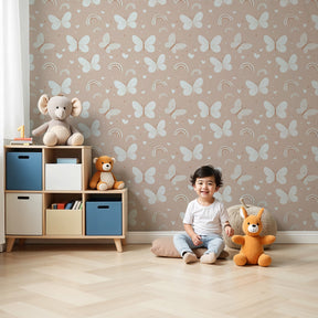 Delicate butterfly and rainbow mural wallpaper in soft pink nursery room by Kids-Mundo